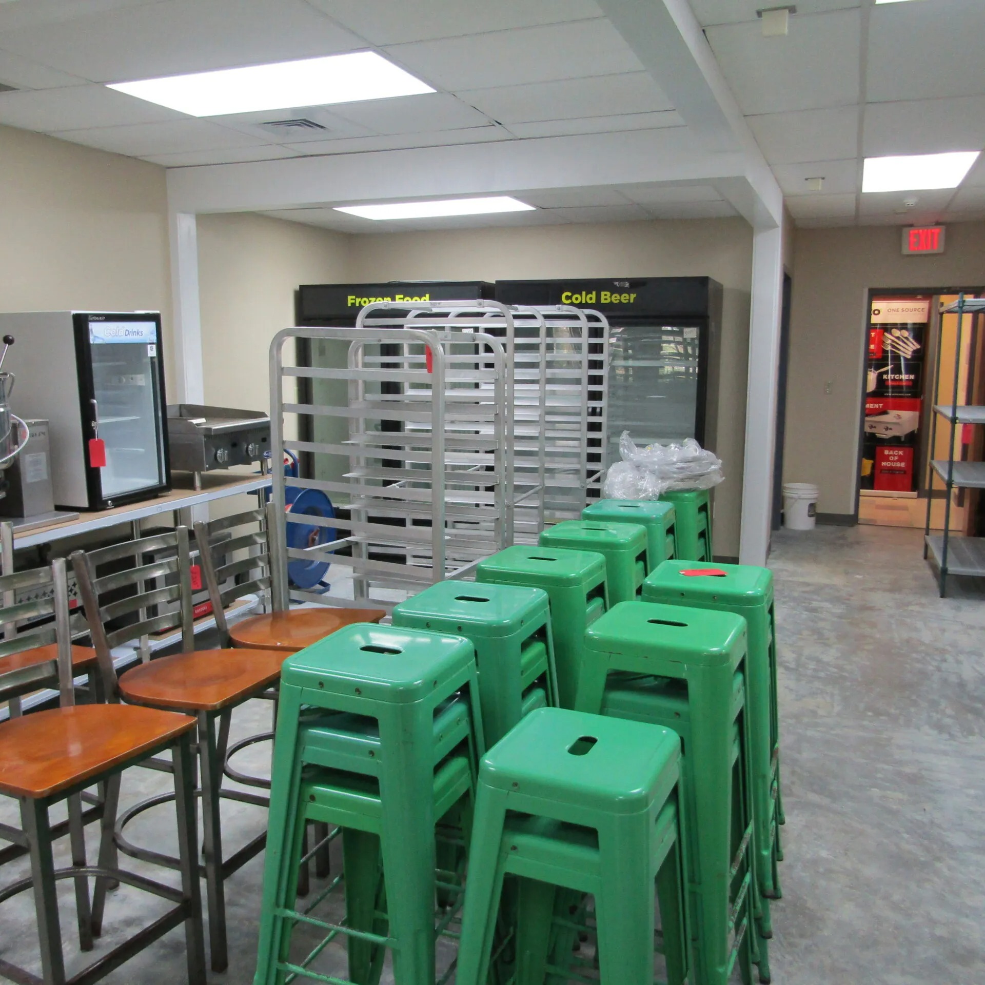 Used restaurant equipment and seating in the PoBoys showroom